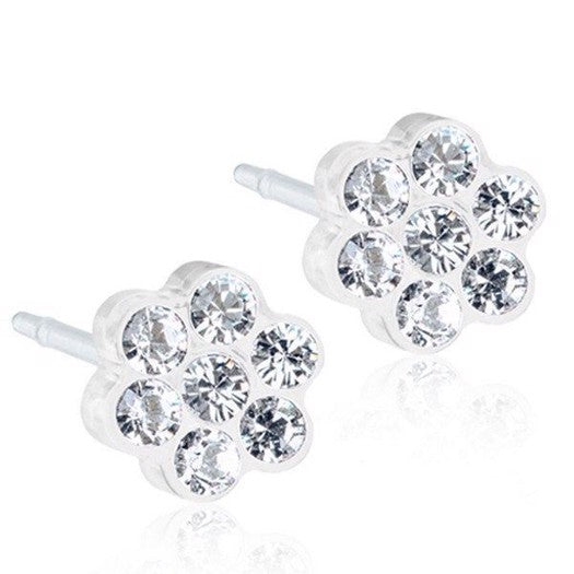Blomdahl Daisy Crystal ørestikker i medicinsk plastik med klare zirkonia i blomsterform, 5 mm.